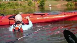 Practicing deep water re-entry on a Wilderness Systems Sit-on-Top