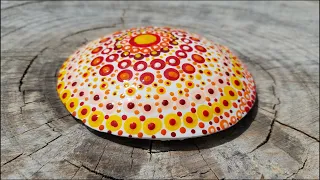 Orange Yellow and Red Painted Dot Mandala, made out of a homemade mold.