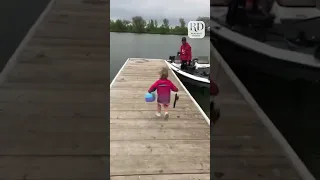 Excited Little Girl Runs Towards Dad's Boat to go Fishing