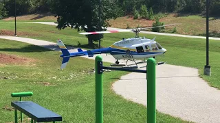 Emile Sheriff flying his 600 size Long Ranger at the park