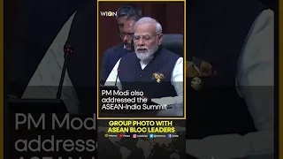 PM Modi poses for a photograph along with other ASEAN bloc leaders