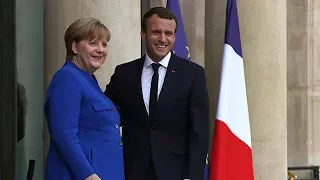 Merkel arrives in Paris to attend cabinet meeting with Macron