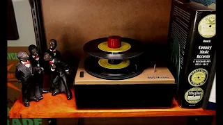 My 1950 RCA 45 rpm player, spinning six records by the Rebels Quartet.