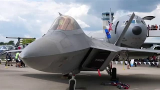 F-22 F-35 F-15 F-16 F/A-18 and Other Military Aircraft Outside Boeing Plaza - EAA Oshkosh Airventure