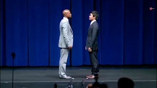 Mayweather and Pacquiao face-off onstage, bracing themselves for the fight of the century