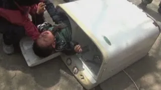 Two-year-old boy rescued from washing machine