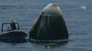 NASA astronauts in SpaceX capsule make splashdown for the first time in 45 years.