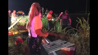 Victims rescued from alligator-infested canal