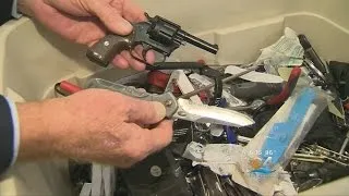 TSA Shows Off Guns, Knives, Machetes Seized At MIA