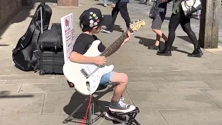 The Young Ones 8 year old on guitar busking Chester / excellent street entertainment / Cliff Richard