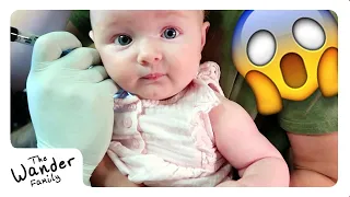 BABY GETS HER EARS PIERCED WITH DADDY!!! | The Wander Family