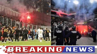 Marseille v Galatasaray STOPPED 9 minutes as fans clash with FLARES thrown at rival supporters