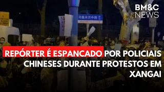 REPÓRTER É ESPANCADO POR POLICIAIS CHINESES DURANTE PROTESTOS EM XANGAI