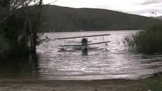 J2F-6 Grumman Duck go in water from a ramp