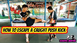How to escape a caught push kick #sitjaopho#muaythai#tecnic#pushkick#escape#training