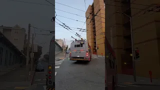 SF Muni trolley bus makes the wrong switch before the intersection