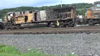 Norfolk Southern Leetsdale crew watches fire damaged UP 5594, NS 8402 UP 3780  pass 7/3/14