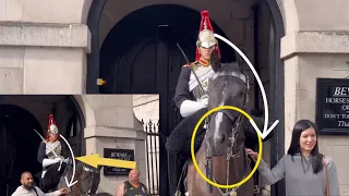 DISRESPECTFUL TOURISTS REFUSE TO RELEASE HOLD ON THE KING’s guard horse reins!!!