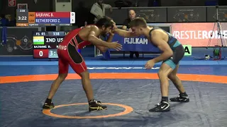 1/8 FS - 65 kg: B. BAJRANG (IND) v. Zain Retherford (USA)