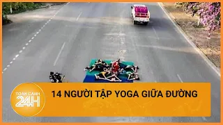 14 người tập yoga giữa đường để chụp ảnh với hoa bằng lăng bị phạt thế nào? | Toàn cảnh 24h