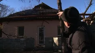 Blood and destruction, east Ukraine residents suffer shelling