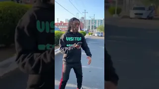Lil Uzi Vert freestyles with fans at gas station, while wearing his own merch.