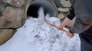 Unclogging Frozen Culvert Ice Dam