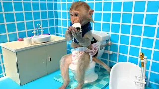 Monkey Baby BoBo buys toilet paper in the supermarket and plays with the Puppy So cute