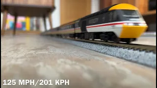 Model trains running at scale speed