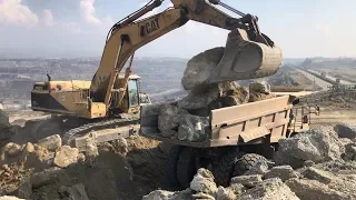 Caterpillar 375 LME Excavator Loading Rocks On Caterpillar Dumpers - SotiriadisLabrianidis Mining