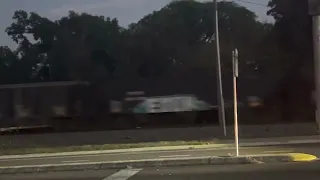 1 locomotives leads 73 cars - CSX coal and rock train goes by Seffner, FL