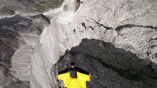 Guy Does BASE Jumping Off Cliff in Italy - 1376250