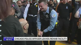 Supporters cheer on Officer Yanez Jr. as he leaves rehab facility