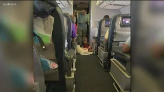 United Airlines crew helps autistic boy during flight