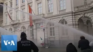 Police Use Water Cannon During Climate Protest in Brussels