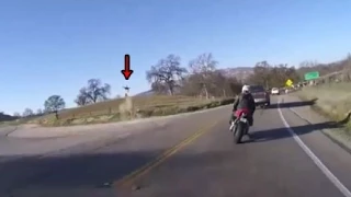 Biker Nearly Gets Hit By SUV, Then Goes Airborne In Spectacular Crash