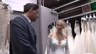 She's looking for her wedding dress... and will drive the salesman crazy!