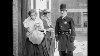 CHARLIE CHAPLIN : THE SAVIOUR POLICE MAN.