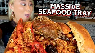 EATING A MASSIVE SEAFOOD TRAY at San Pedro Fish Market in Long Beach, CA!! #RainaisCrazy