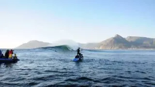 Catching a wave at Sunset Reef, Kommetjie