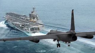 Gigantic US Spy Plane Lands on a US Aircraft Carrier