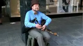 A left handed uilleann pipe player