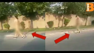 A Woman Walks Around Naked on The Road in Rawalpindi