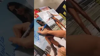 Tenille Dashwood signs autographs 7/30/2022