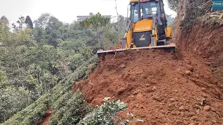 JCB Backhoe Leveling Mountain Top Narrow Road Saving Downhill Farm