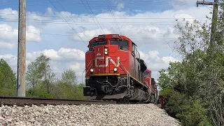 CN 8842 leads CN M337 through Glendale Heights, IL on Star Wars Day.