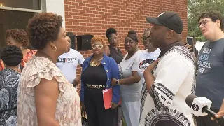 Argument unfolds at community meeting to provide healing one week after Dollar General shooting