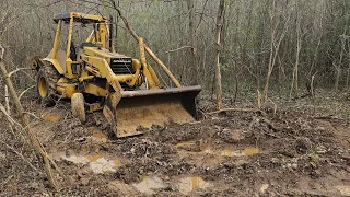 Storm Damage PLUS Backhoe and Tundra STUCK in Mud!