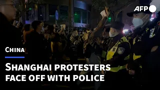 Shanghai protesters face off with police | AFP