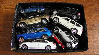 Large and Small Toy Cars in the Box